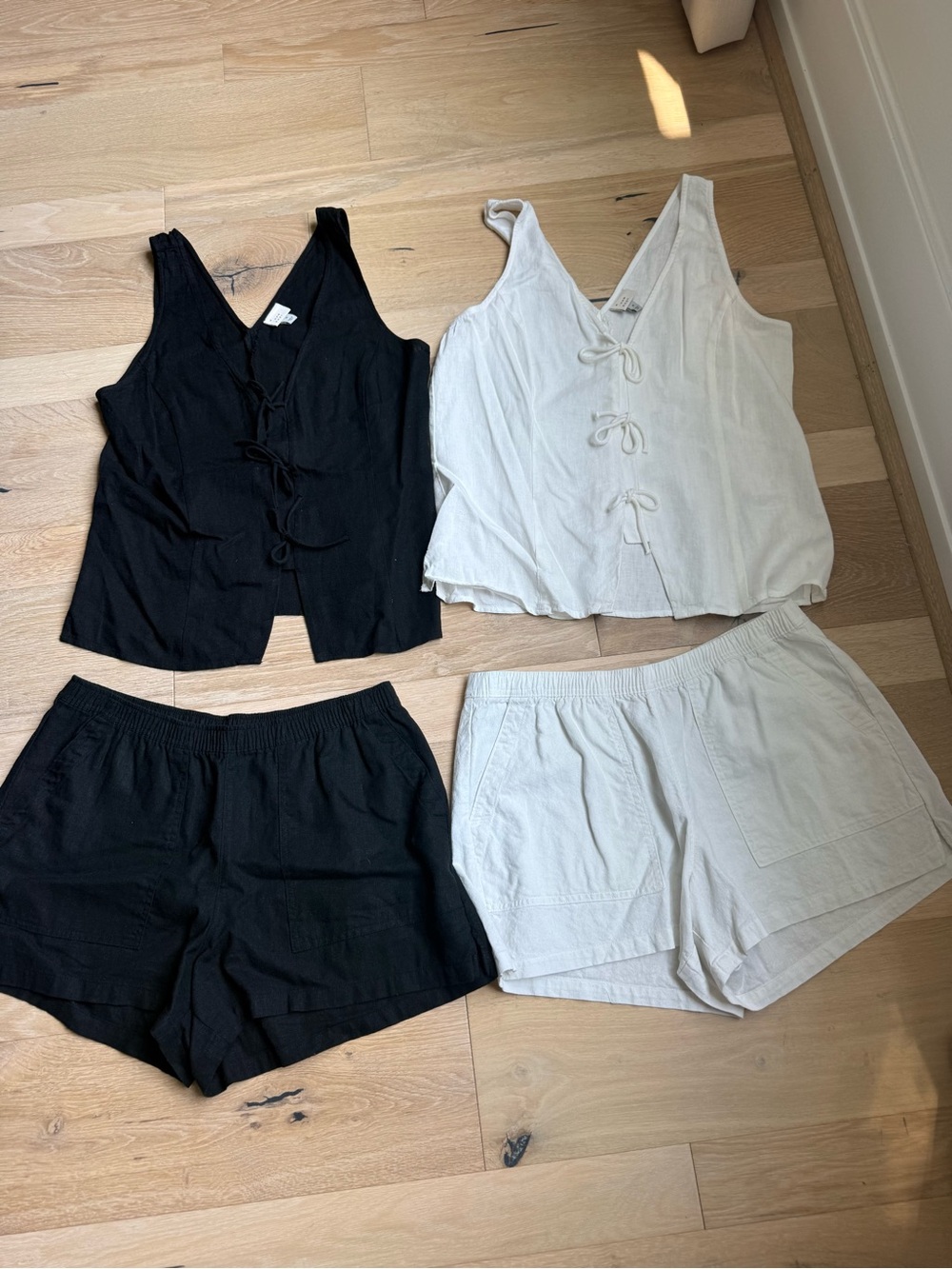 2 sets. White and black  Tie-Front Linen Tank and shorts with pockets.